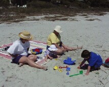 Rachel playing in the sand.