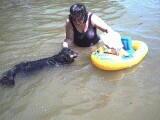 Rachel, mommy, and Trixie playing in the lake.