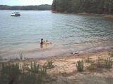 Rachel, mommy, and Grandma Jo playing in the lake.