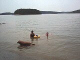 Rachel, mommy, Grandma Jo, and Teddy playing in the lake.